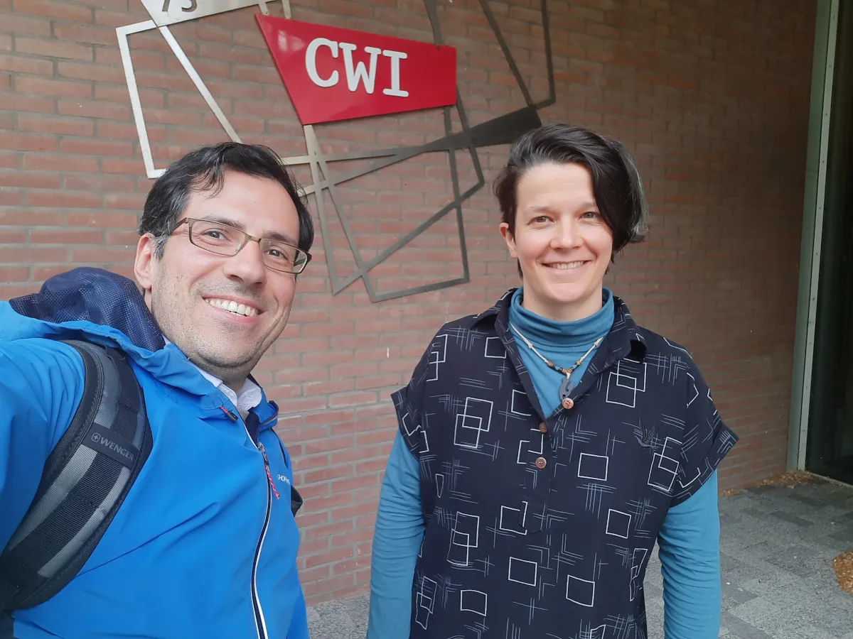 Grantee and host at CWI